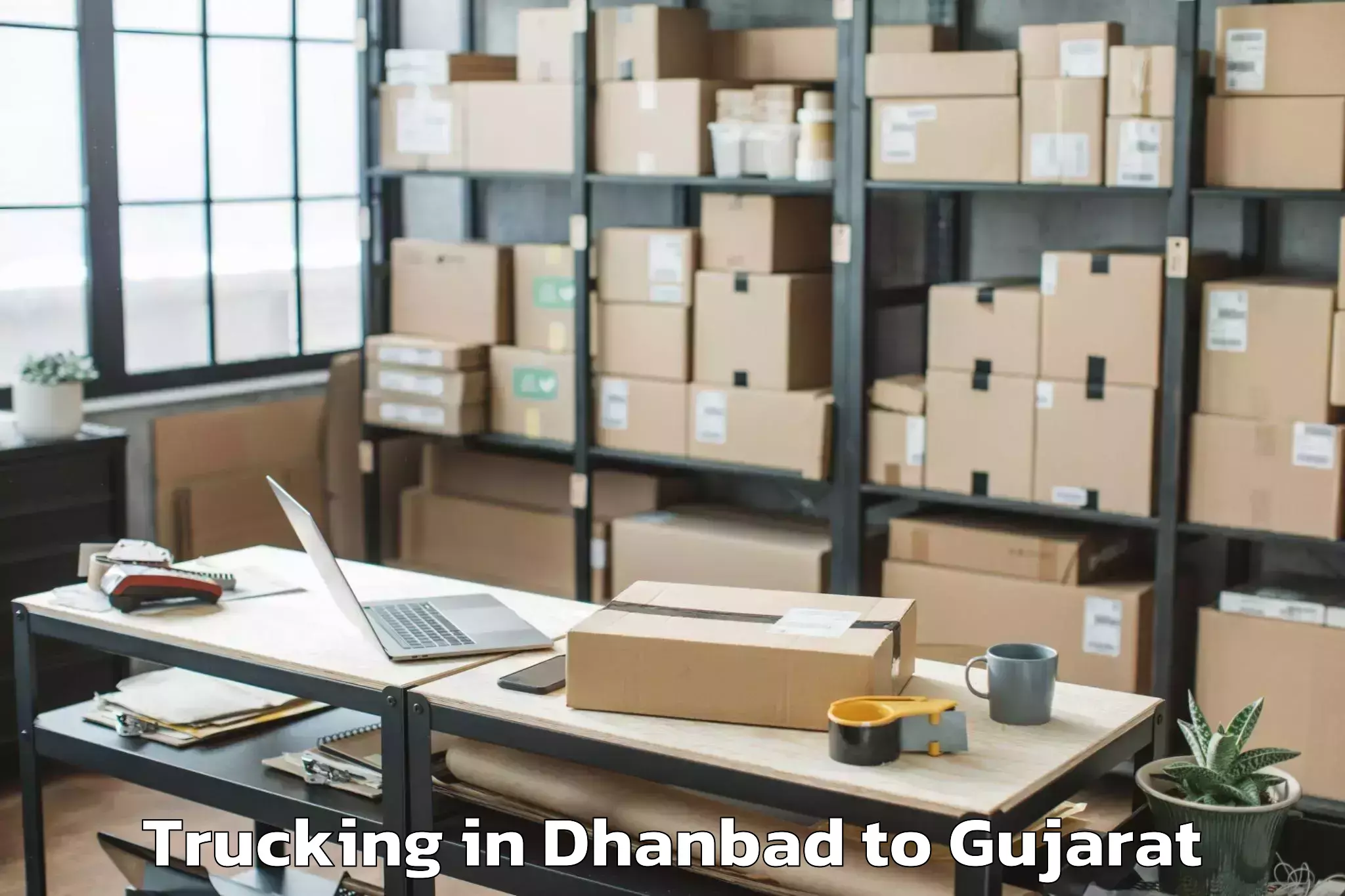 Book Dhanbad to Himmatnagar Trucking Online